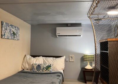 Twin bed situated in loft.