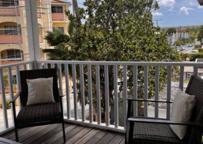 Verandah with 2 single chairs.