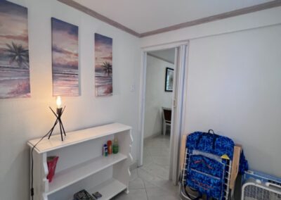 Hallway showing games and beach equipment.
