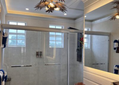 Full view of the bathroom with large double shower doors.