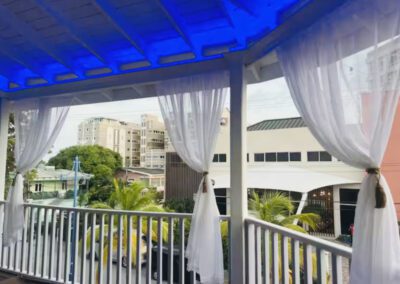 Verandah with blue strip lighting on.